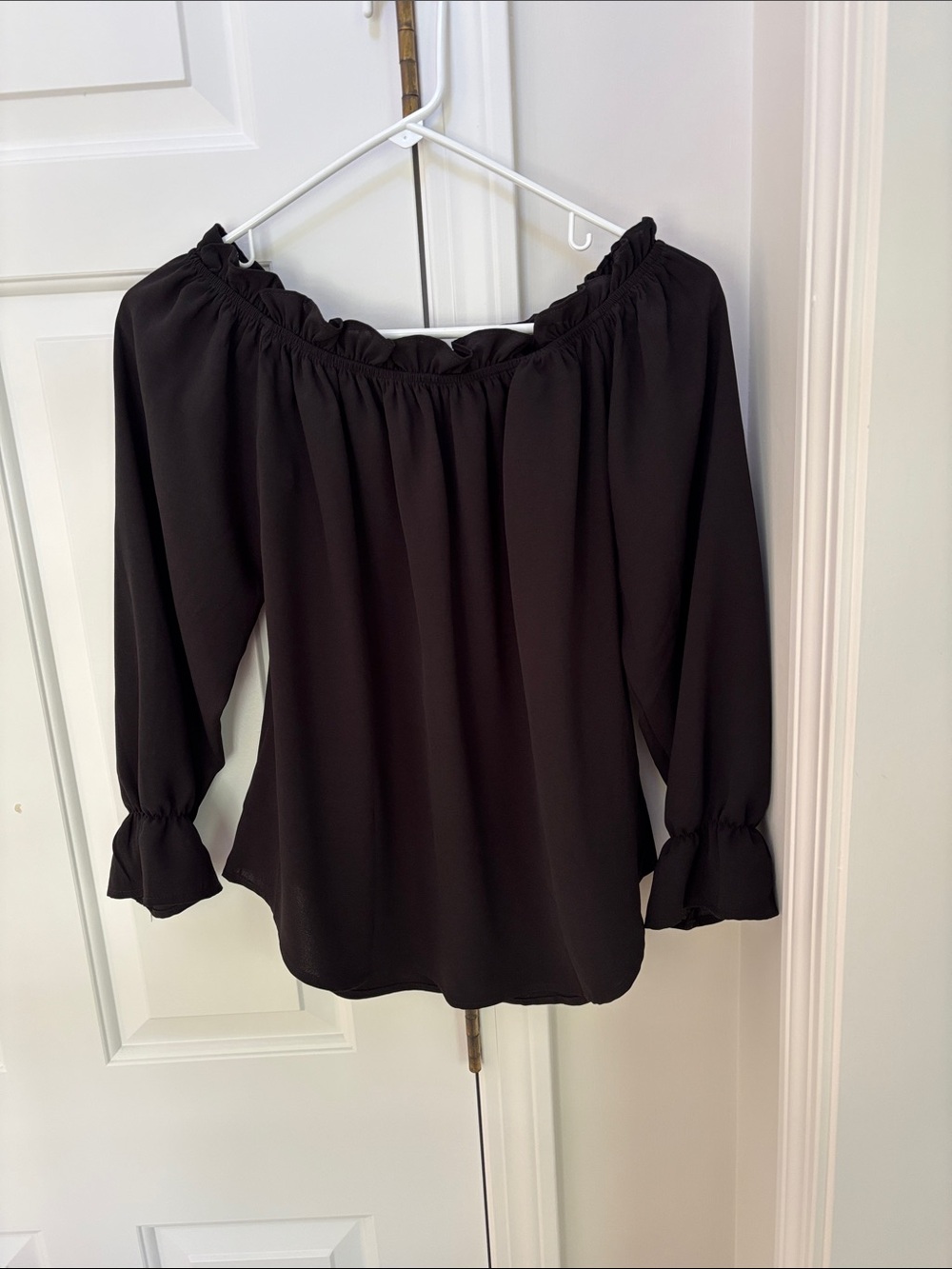 Women’s Black Off-Shoulder Ruffle Blouse. Size S
